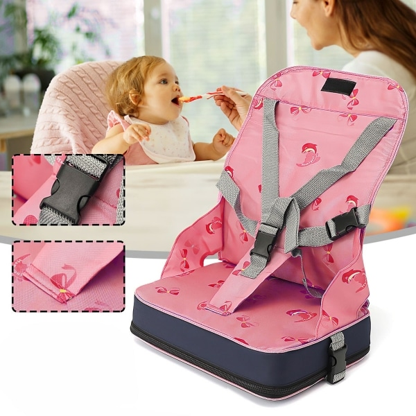 Chaise pour bébé portable rose avec la maman qui donne à manger à son bébé