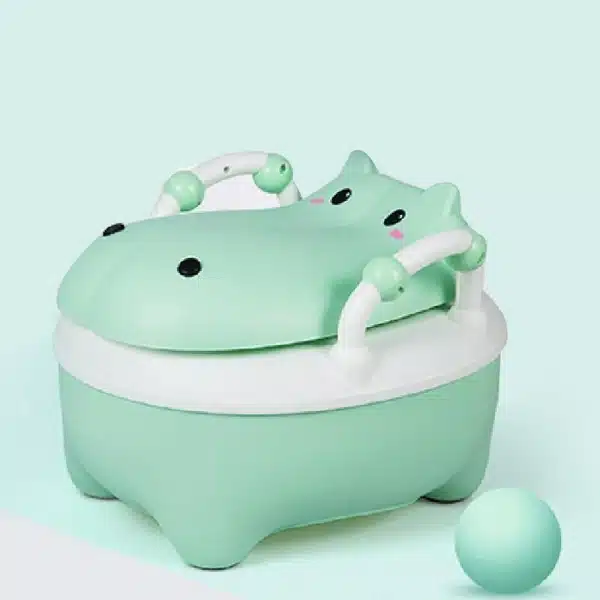 Un pot de toilette motif hippopotame pour bébé tout mignon vert avec un fond vert