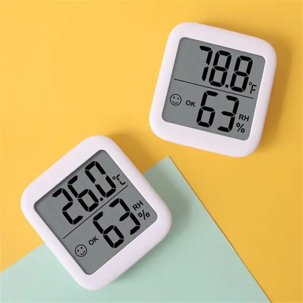 Thermomètre et hygromètre numérique pour chambre de bébé avec un fond jaune