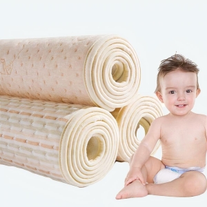 Tapis à langer imperméable en coton beige avec un bébé qui sourit