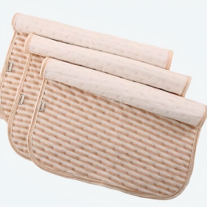 Drap de lit en coton pour nouveau-né avec un fond beige