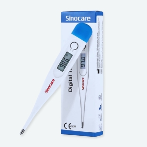 Thermomètre frontal à infrarouge pour bébé avec un fond blanc