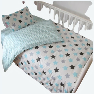 Kit de linge de lit pour berceau bleu avec des étoiles