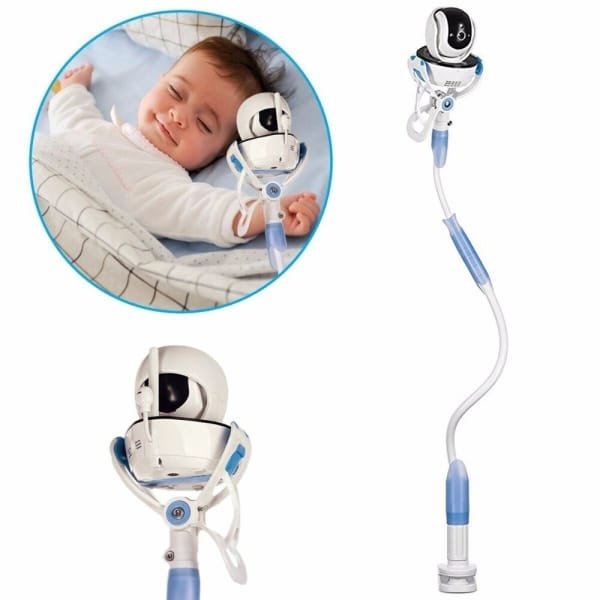 Babyphone vidéo sans fil avec support avec un fond blanc et un bébé qui dort