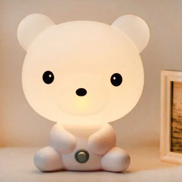 Lampe de nuit en forme d'ours avec une lumière blanche