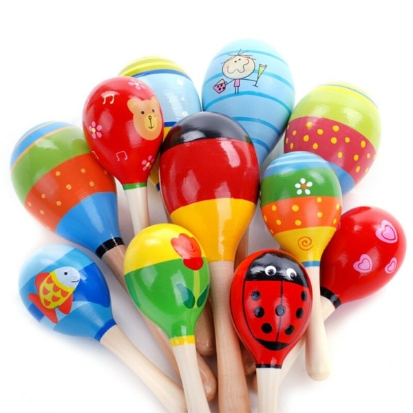 Hochets de balle en bois avec plusieurs coloris et motifs différents