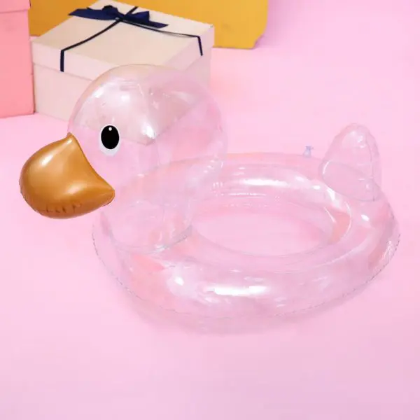 Bouée de natation gonflable en forme de canard transparent avec un fond rose