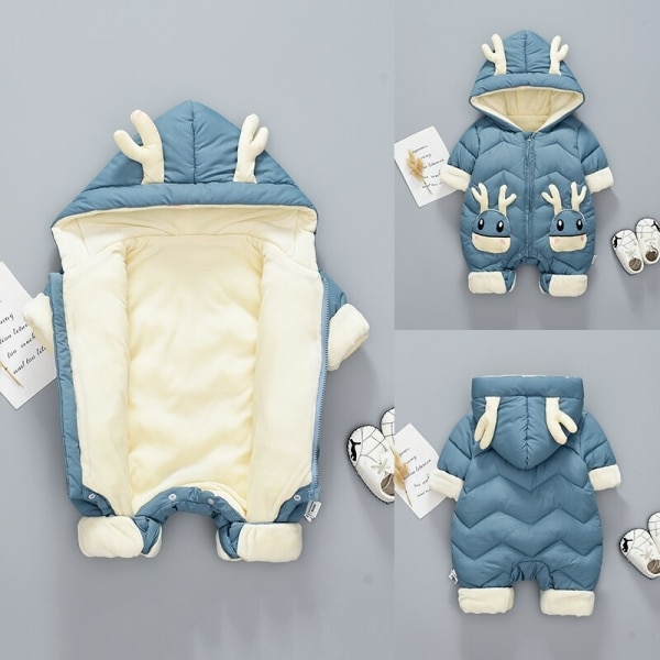 Salopettes bleu épaisse pour bébé avec un fond gris