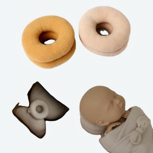 Oreiller en forme de donut avec un mannequin bébé pour faire une demonstration de l'oreiller