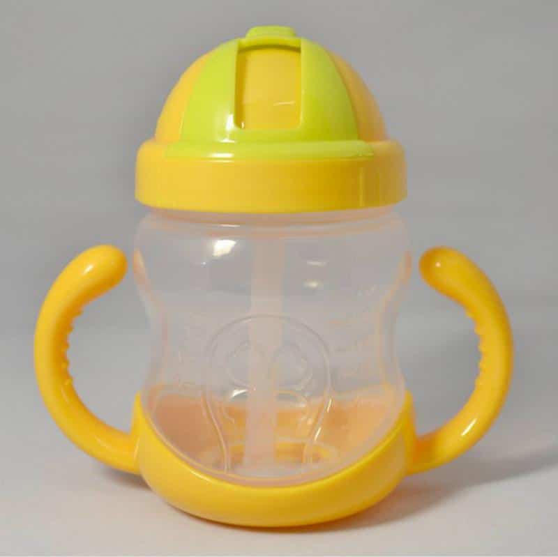 Biberon de 240 ml avec tétine en silicone pour bébé jaune avec un fond gris