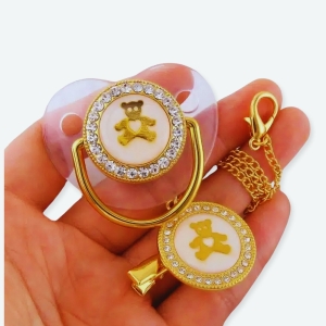 Sucette orthodontique à motif ours dorée