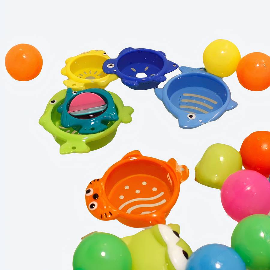Jouet de bain flottant en forme d’animaux de mer pour bébé a plusieurs coloris dans l'eau