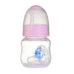 Biberon pour bébé de 0 à 18 mois transparent avec le bouchon en rose et un fond blanc