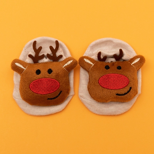 Chaussettes avec renne de Noël pour bébés garçons et filles avec un fond orange