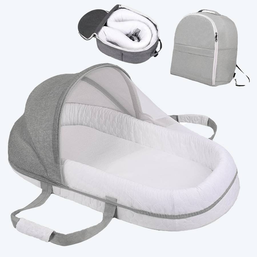 Berceau de voyage Portable avec moustiquaire pour bébé gris avec un fond blanc