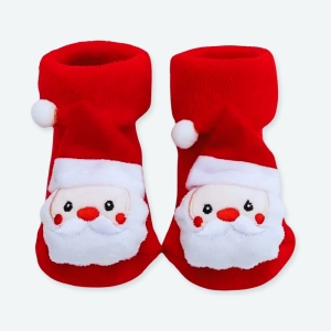 Chaussettes Père Noël en coton pour enfants rouge avec un fond blanc