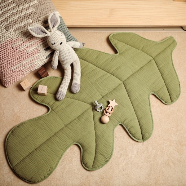 Tapis de sol pour bébé verte avec doudou lapin