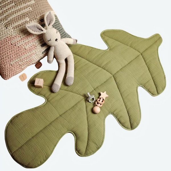 Tapis de sol pour bébé verte avec doudou lapin