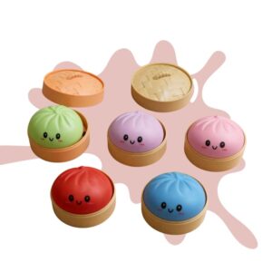 5 boites avec à l'intérieur un squishy dumpling en forme de brioche vapeur, toutes d'une couleur différente.